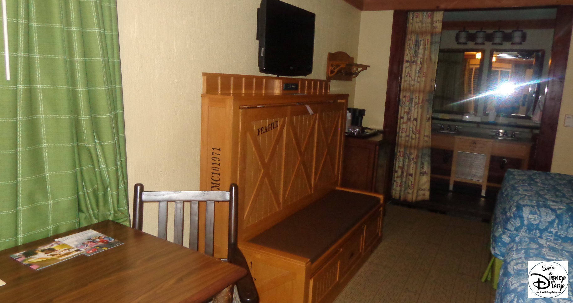 Inside an Alligator Bayou room. The Banquette Bench Seat folds down to reveal a 63"x30" bed.
