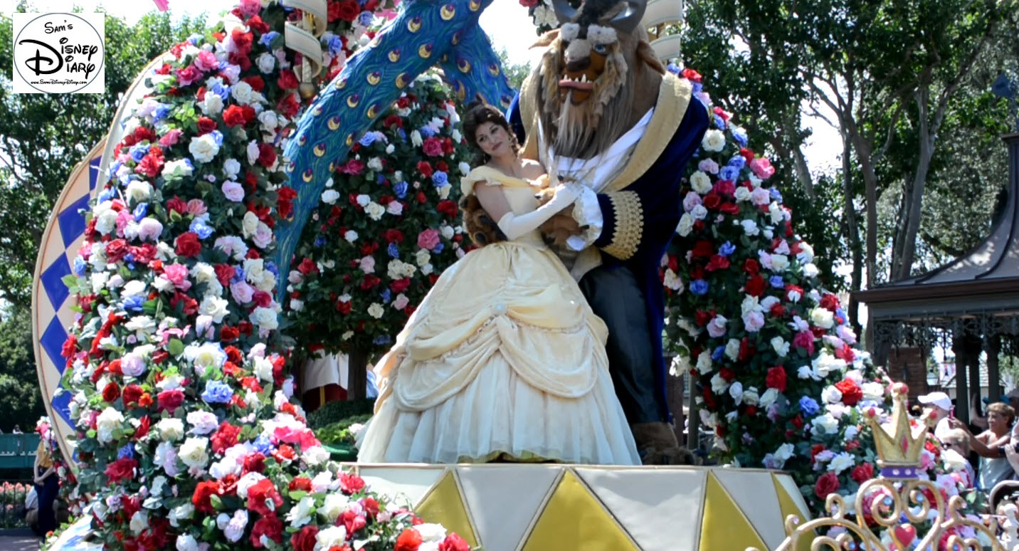 Bell and Beast lead the Festival of Fantasy Parade.