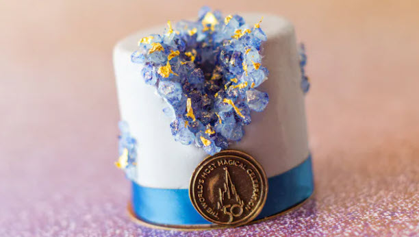 Amorette’s Patisserie 50th Anniversary Petite Cake Get ready for something sweet! Enjoy the decadent taste of the 50th Anniversary Petite Cake––a vanilla chiffon cake with blueberry jam, celebration blue mousse and lemon curd.