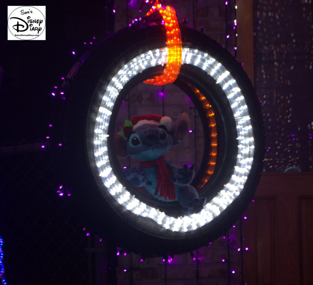 Is that Stitch in the Tire Swing?? He is one of many hidden characters.
