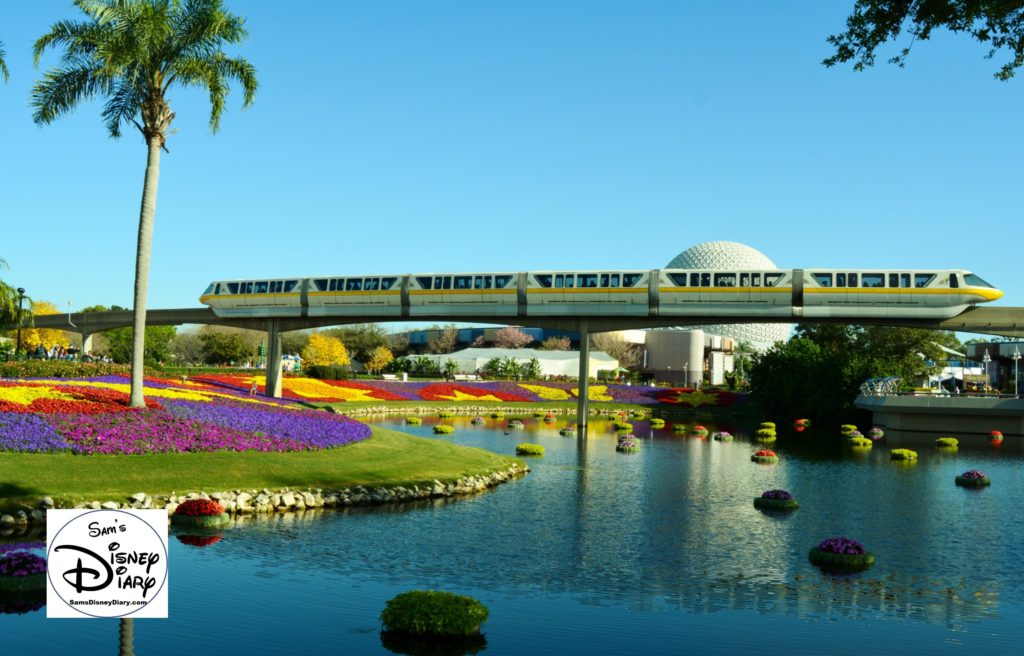 The 2017 Epcot International Flower and Garden Festival - Festival Blooms and a passing monorail