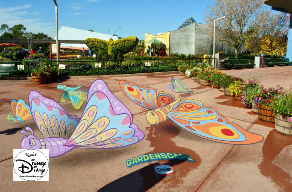The 2017 Epcot International Flower and Garden Festival - One of the new Gardenscape photo opportunities. Those butterflies are on the ground.