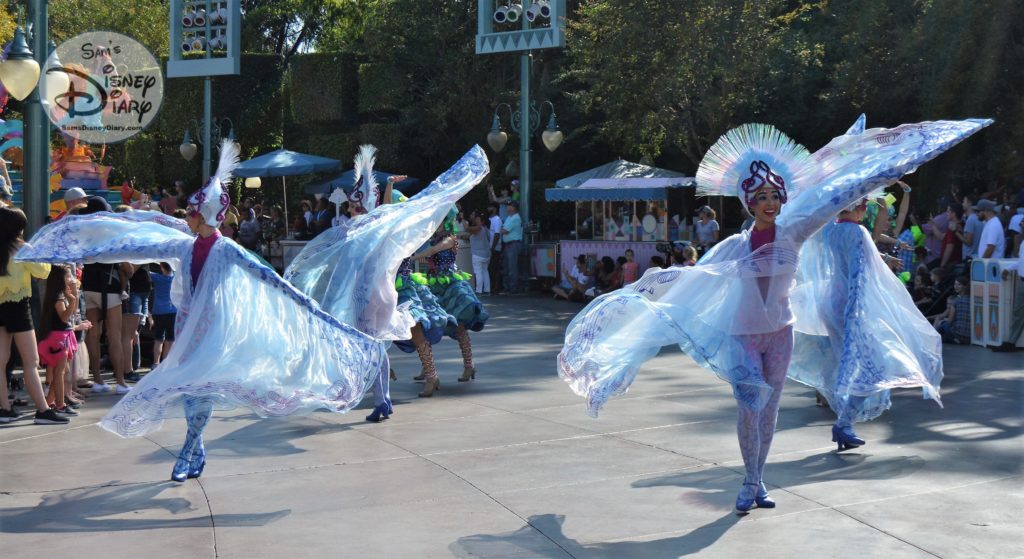 Sebastian's Calypso Carnival Parade Unit Follows Aladdin