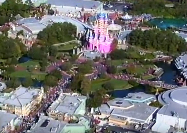 From the 1997 Walt Disney World Happy Easter Parade... the 25th anniversary Castle Cake overlay and hub, notice all of the green area, and how small the hub is...