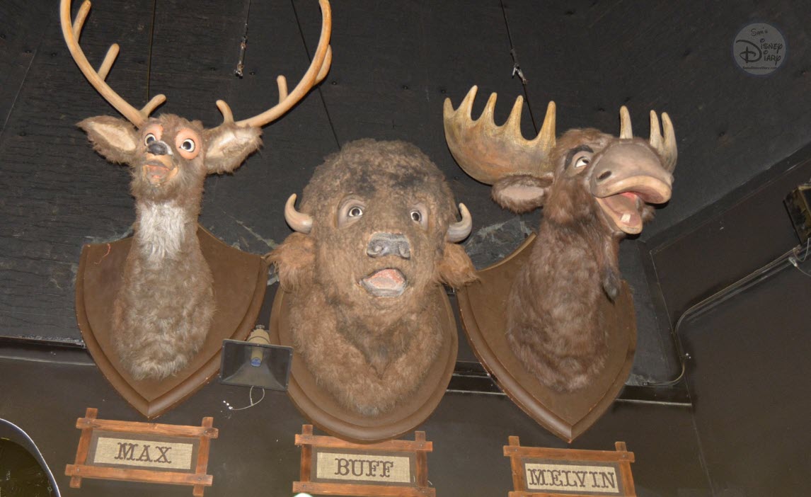 The Many Adventures of Winnie the Pooh (Disneyland vs Walt Disney World) Max, Buff and Melvin on the wall, waiting for the next performance of Country Bears.