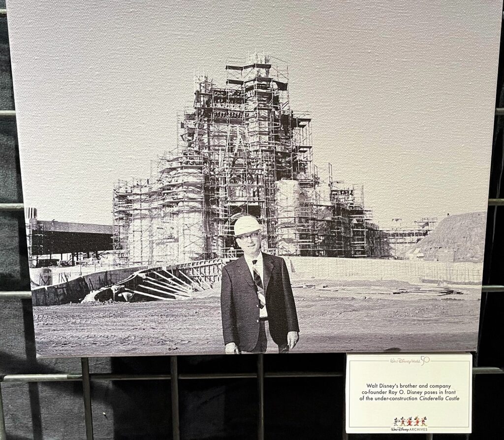 Walt Disney World 50th Anniversary | D23 Archives | Disney Archives | Disney World History | Walt Disney | Becky Cline Roy Disney in front of Cinderella Castle during Construction