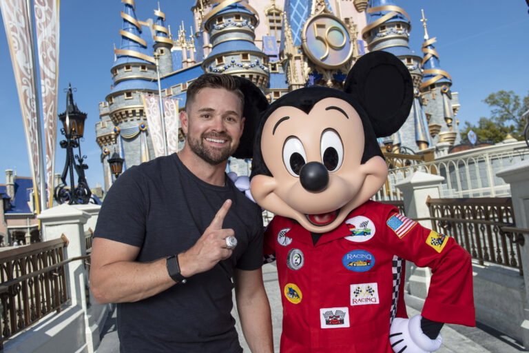 Daytona 500 winner Ricky Stenhouse Jr. celebrates the biggest win of his career at Walt Disney World Resort in Lake Buena Vista, Fla. on Feb. 20, 2023. Less than 24 hours after capturing the checkered flag, Stenhouse showed off his championship ring to his racing buddy, Mickey Mouse at Magic Kingdom Park. (David Roark, photographer)