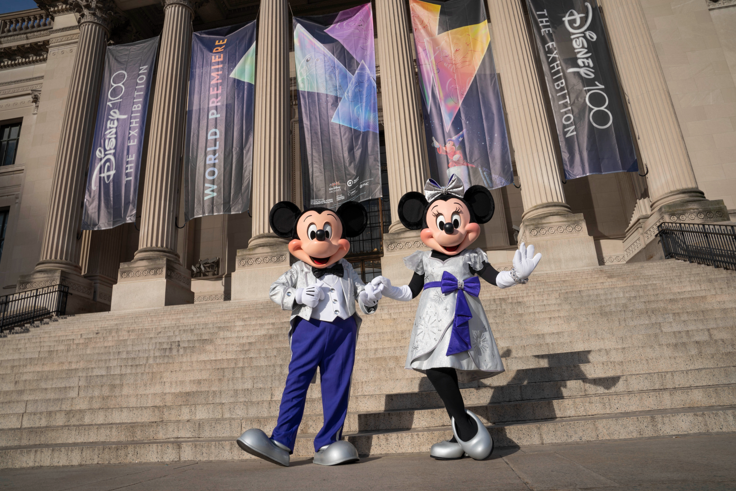 Mickey and Minnie outside The Franklin Institute in Philadelphia for the opening of Disney 100 The Exhibition