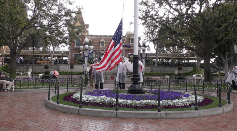 The Disneyland Flag Retreat Happens Every Day, even when it's raining