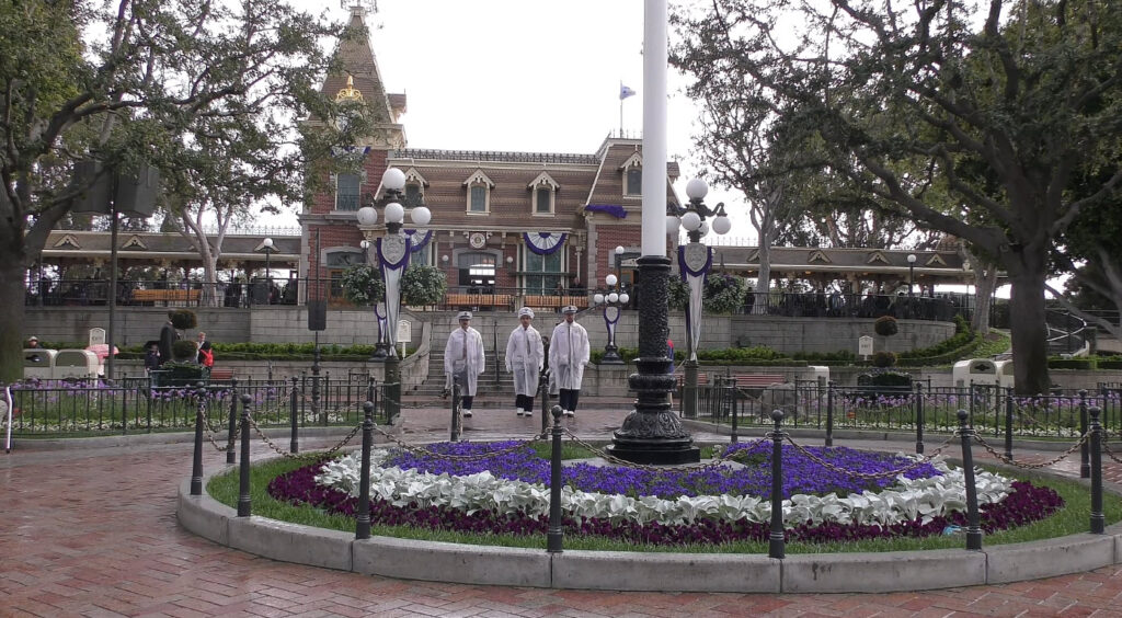 The Disneyland Flag Retreat Happens Every Day, even when it's raining