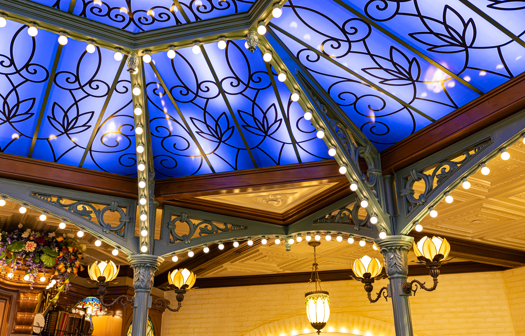 Guests will find a blue skylight inside Tiana’s Palace, which will open in New Orleans Square at Disneyland Park in Anaheim, Calif., on Sept. 7, 2023. Inspired by the Walt Disney Animation Studios film “The Princess and the Frog,” the reimagined quick service restaurant will serve authentic New Orleans flavors inspired by Tiana’s friends and adventures. While Tiana’s Palace is not a character dining location, guests may find Tiana in New Orleans Square. (Christian Thompson/Disneyland Resort)