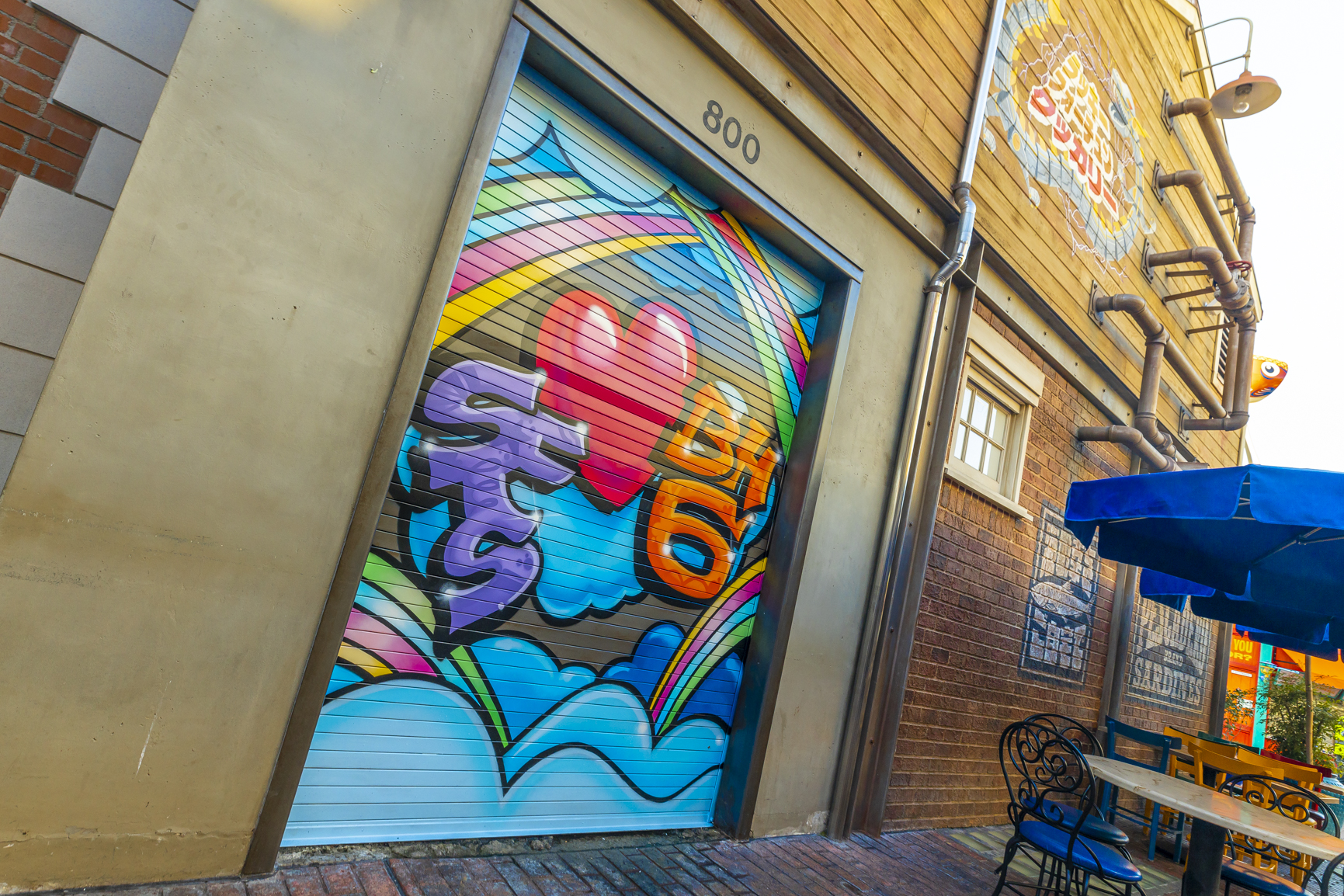 Throughout San Fransokyo Square at Disney California Adventure Park in Anaheim, Calif., guests will discover that the local businesses and eateries are decked out in street art and decor celebrating the Big Hero 6 team after their victory over Yokai. (Christian Thompson/Disneyland Resort)