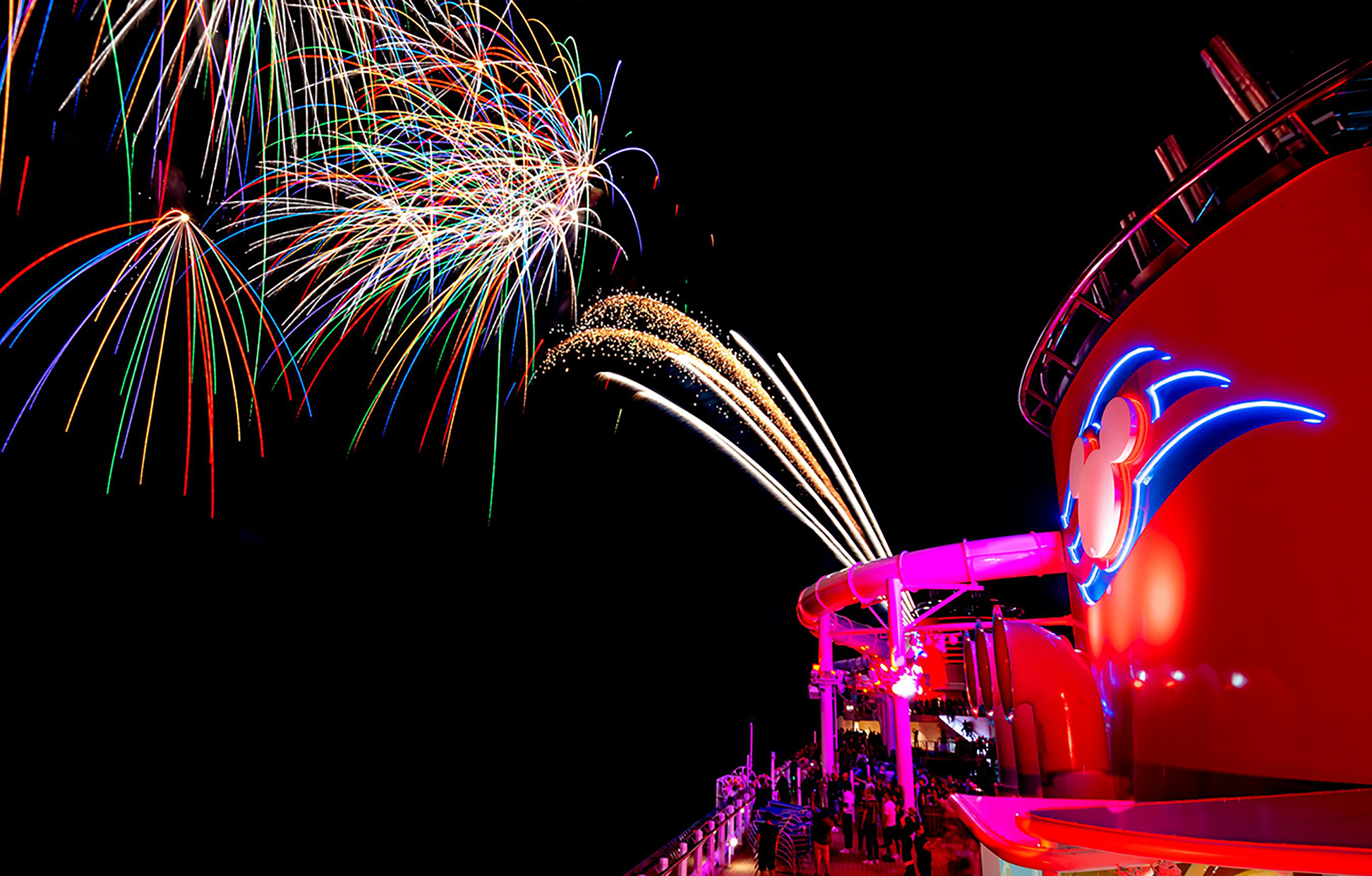 Another signature Disney Cruise Line nighttime deck celebration, Pirate’s Rockin’ Parlay Party, returns aboard the Disney Treasure. On one special night of every voyage, guests of all ages can don their most swashbuckling pirate garb and head to the upper decks for a rollicking rock-and-roll extravaganza, complete with fireworks at sea like only Disney can do. (Amy Smith, photographer)