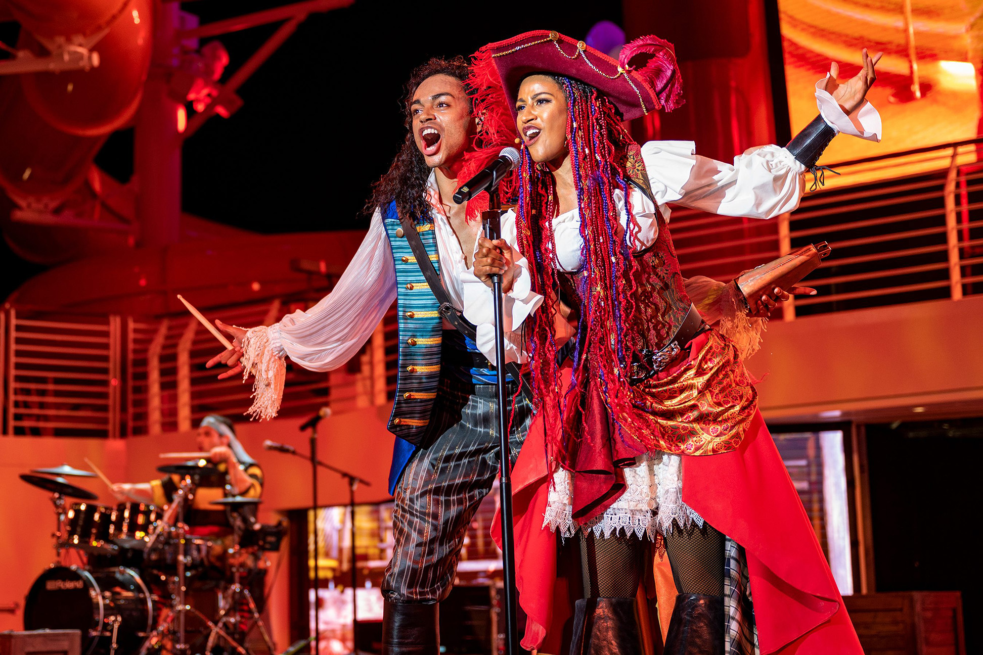 Another signature Disney Cruise Line nighttime deck celebration, Pirate’s Rockin’ Parlay Party, returns aboard the Disney Treasure. On one special night of every voyage, guests of all ages can don their most swashbuckling pirate garb and head to the upper decks for a rollicking rock-and-roll extravaganza, complete with fireworks at sea like only Disney can do. (Matt Stroshane, photographer)