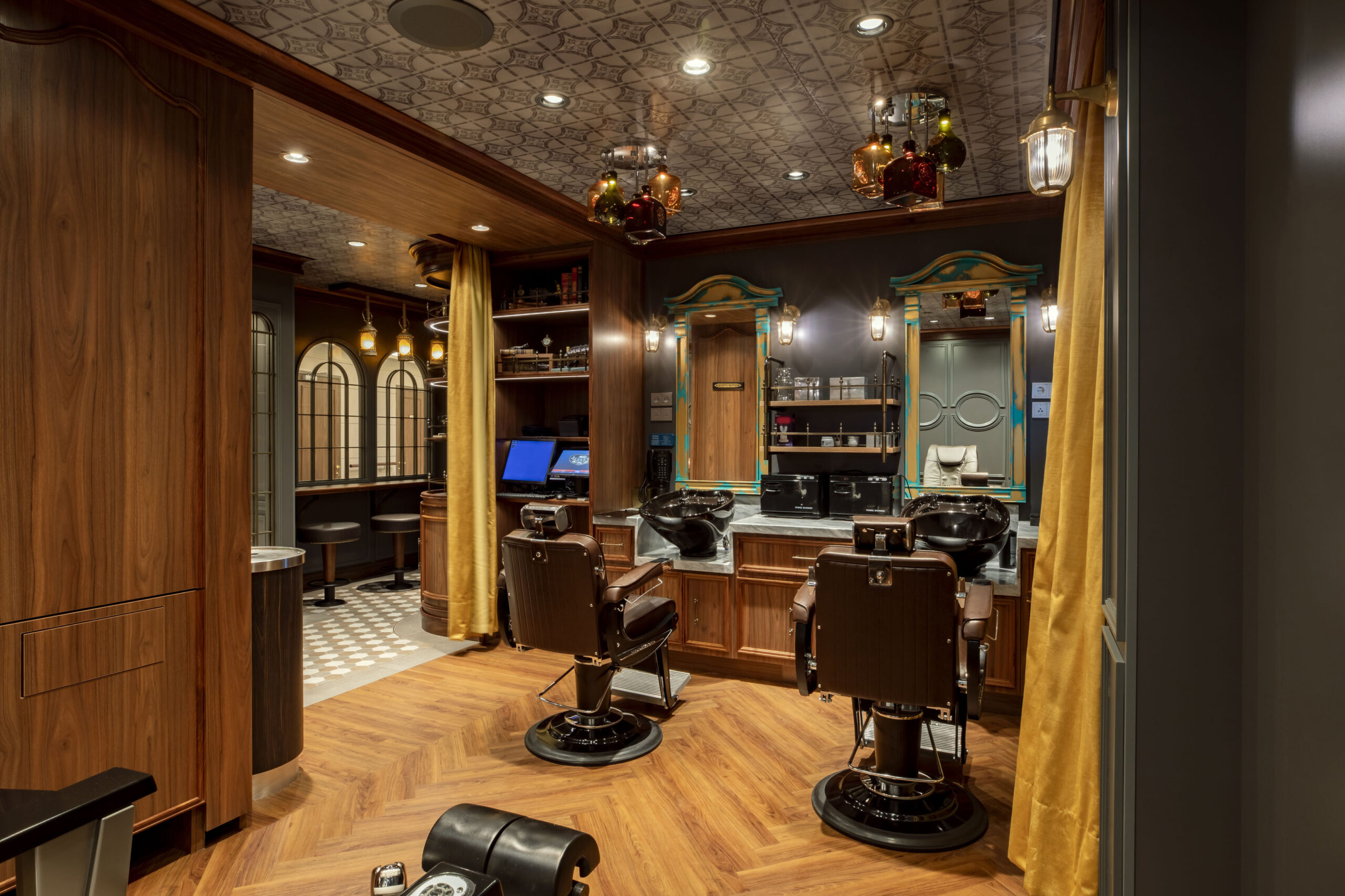Hook’s Barbery, a twist on a traditional European men’s salon, will offer cuts, shaves, and nail and skin care onboard the Disney Treasure. The space will brim with narrative details inspired by its namesake, Captain Hook. Not only will Hook’s Barbery provide salon and barber services, but it will also boast the ultimate toast to a pirate’s life: a hidden bar. (Disney)