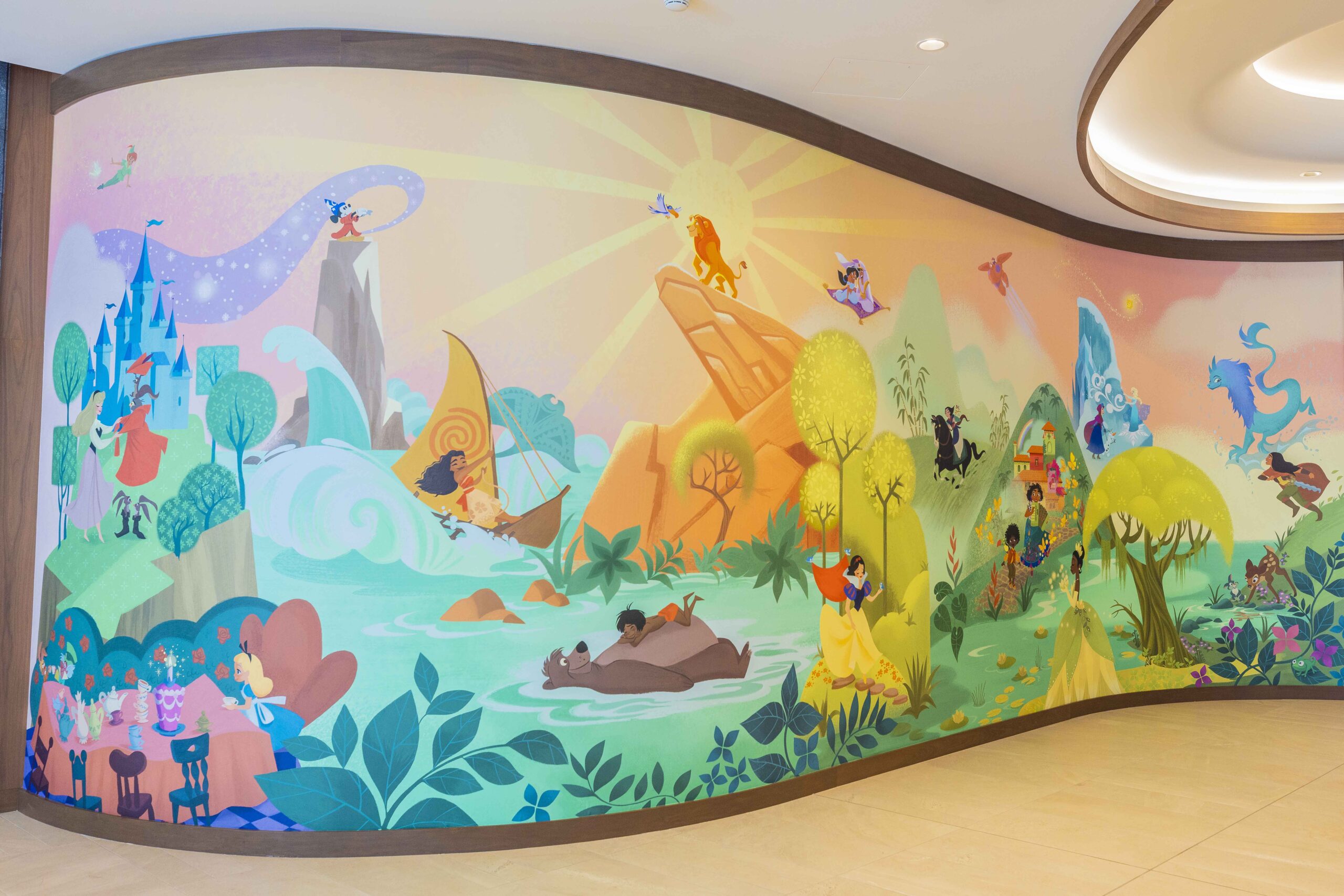 Guests will see beloved Disney characters and stories reflected in the theming of The Villas at Disneyland Hotel at the Disneyland Resort in Anaheim, Calif., including a one-of-a-kind mural in the lobby created by Disney Animation artist Lorelay Bové. (Christian Thompson/Disneyland Resort)