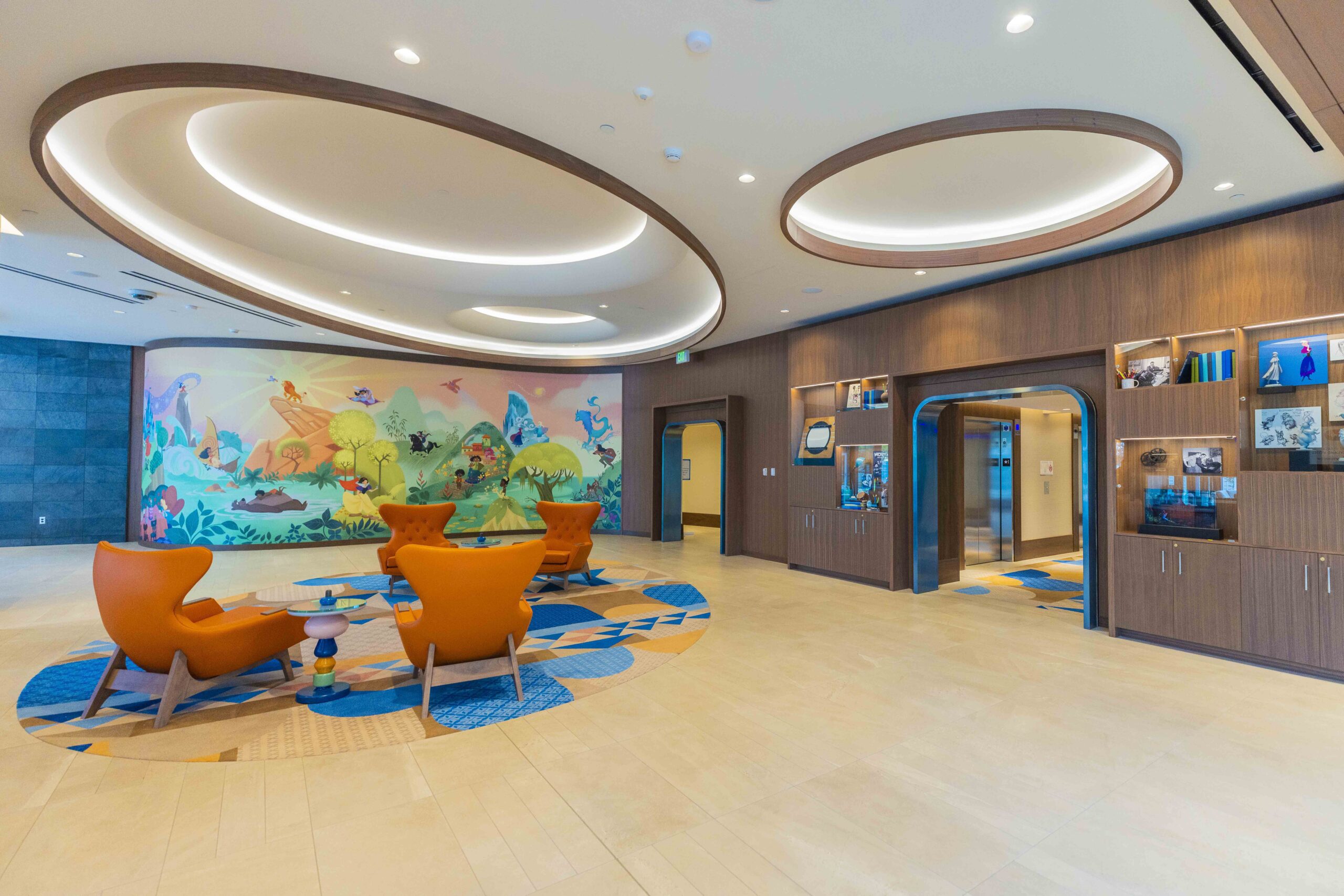 Guests will see beloved Disney characters and stories reflected in the theming of The Villas at Disneyland Hotel at the Disneyland Resort in Anaheim, Calif., including a one-of-a-kind mural in the lobby created by Disney Animation artist Lorelay Bové. (Christian Thompson/Disneyland Resort)