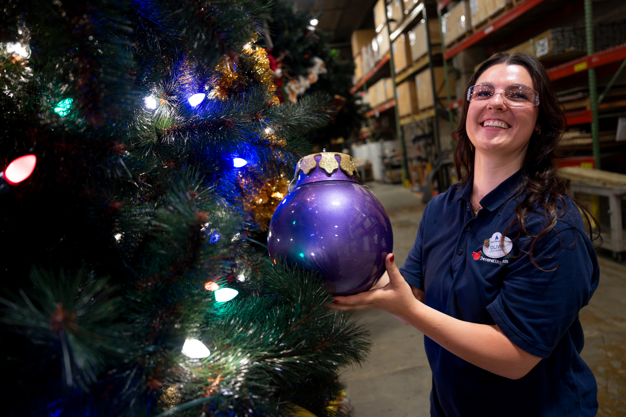 The team of designers, decorators and other professionals at Walt Disney World Holiday Services prepare and install more than 600 trees and 1,700 wreaths, and hang nearly nine miles of garland each year to transform four theme parks, resort hotels, Disney Springs and the rest of the resort into a holiday wonderland. (Harrison Cooney, Photographer)