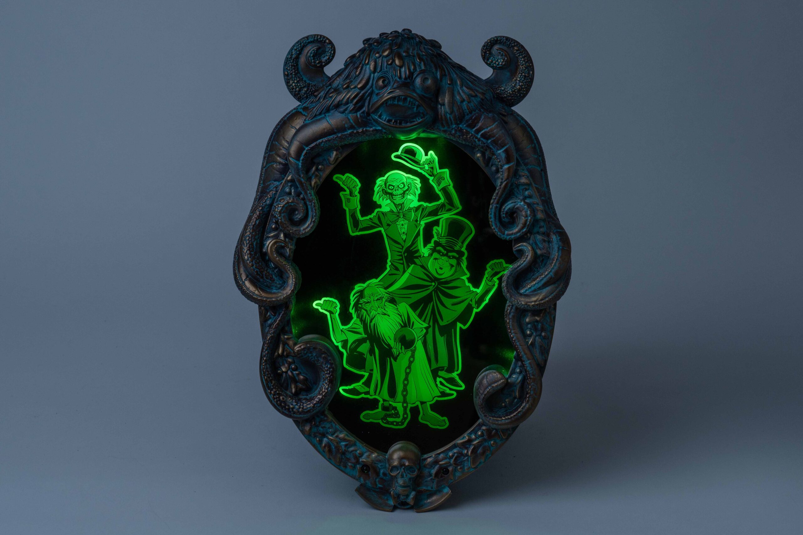 The Haunted Mansion Parlor Mirror will allow Disney Cruise Line guests to take home a piece of the magic, offering a ghoulish surprise to unsuspecting users when the hitchhiking ghosts mysteriously appear. (Steven Diaz, Photographer) ©Disney