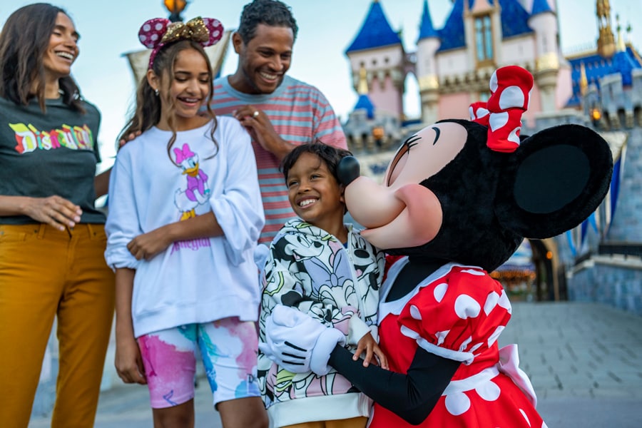 Minnie Mouse with a family at Disneyland park