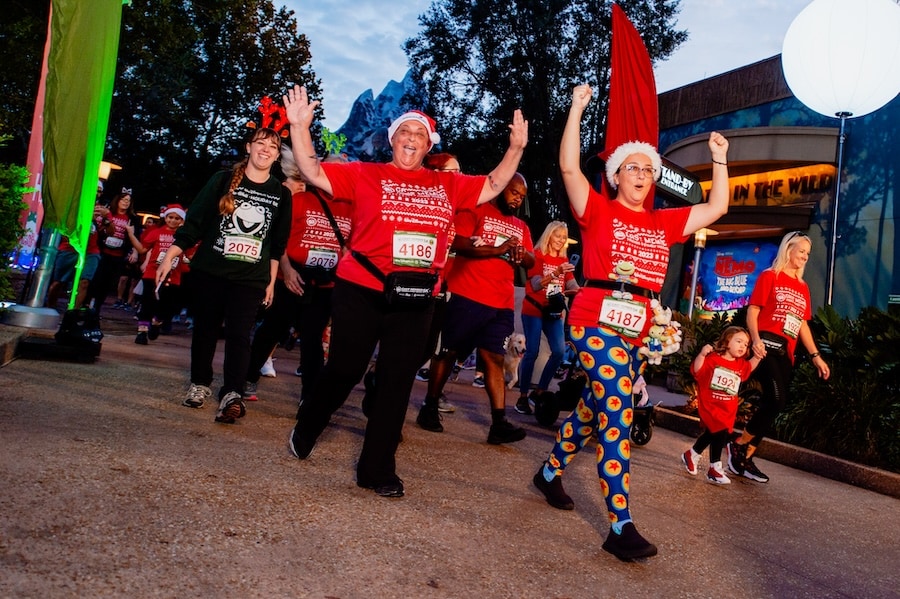 Cast members running though Downtown Disney at the Disneyland Resort during the Be Well...Cast Member, Friends & Family Holiday 5K