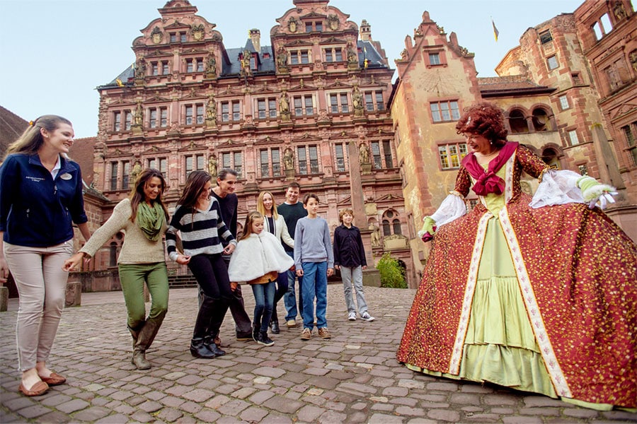 Adventures by Disney families on a costumed guide through the historic Heidelberg Castle