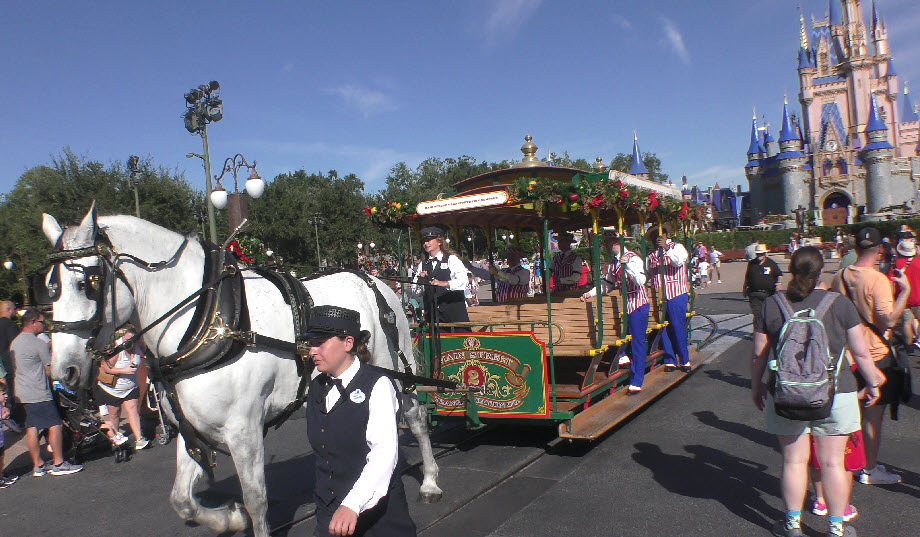 Walt Disney World's Dapper Dans Take a Festive Ride Down Main Street USA | Happy Holidays 2023