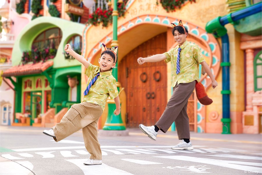 Guests dressed as Nick Wilde in his iconic green button-down with a striped tie merchandise