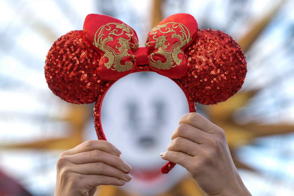 Guests can sport the latest Lunar New Year Minnie Mouse ear headband at the Disneyland Resort in Anaheim, Calif. The Lunar New Year celebration is a joyous tribute to Chinese, Korean and Vietnamese cultures. At the celebration, guests can savor Asian-inspired dishes at Lunar New Year Marketplaces; experience dazzling performances from “Mulan’s Lunar New Year Procession” to “Hurry Home – Lunar New Year Celebration,” and more. (Disneyland Resort)