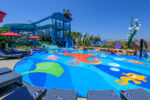 Hotel guests can enjoy a colorful water play area where families can splish and splash at Pixel Pool, take a winding water ride down Crush’s Surfin’ Slide and frolic with Hank on the pop-jet splash pad at Nemo’s Cove at Pixar Place Hotel at Disneyland Resort in Anaheim, Calif. (Richard Harbaugh/Disneyland Resort)