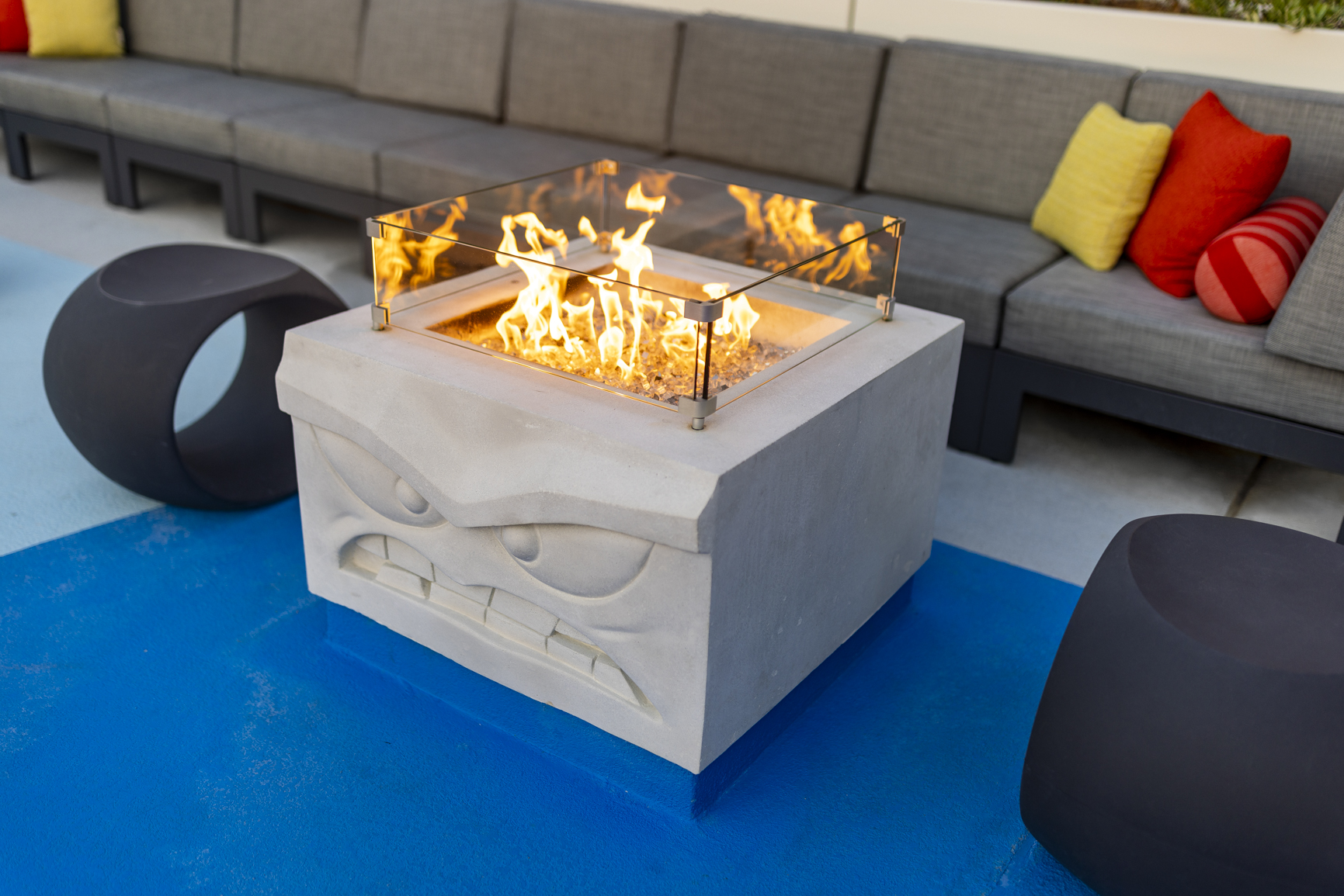 At Pixar Place Hotel at Disneyland Resort in Anaheim, Calif., guests can lounge on the rooftop deck near the pool on cozy couches surrounding firepits inspired by some of Pixar’s more hotheaded characters, including Jack-Jack from Pixar’s “The Incredibles” and Anger from Pixar’s “Inside Out.” (Christian Thompson/Disneyland Resort)