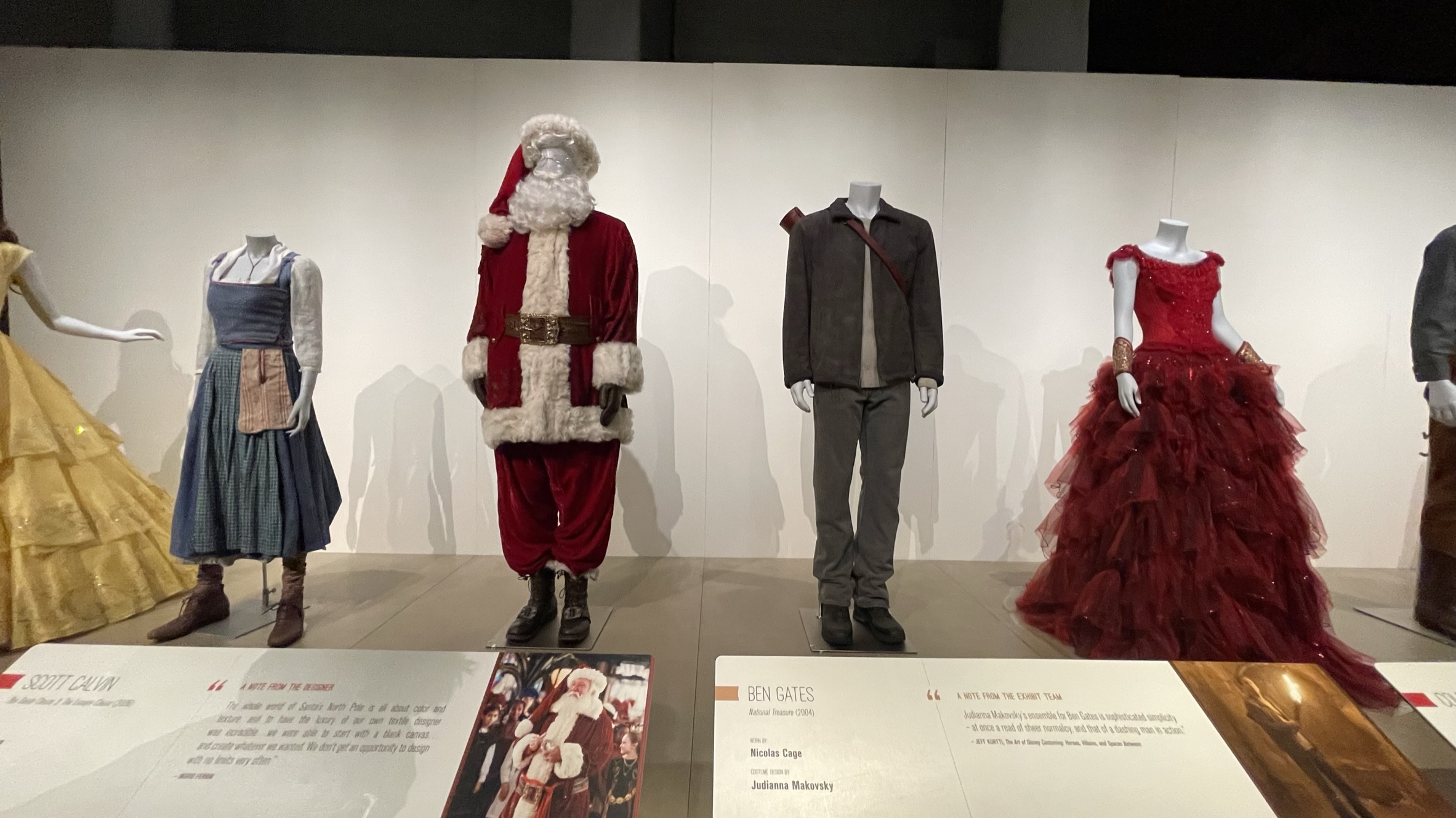 Disney Archives Disney Heroes & Villains: The Art of the Disney Costume 'Cinderella's Workshop Disney Costumes include Ben Gates played by Nicholas Cage and Scott Clavin Santa Clause