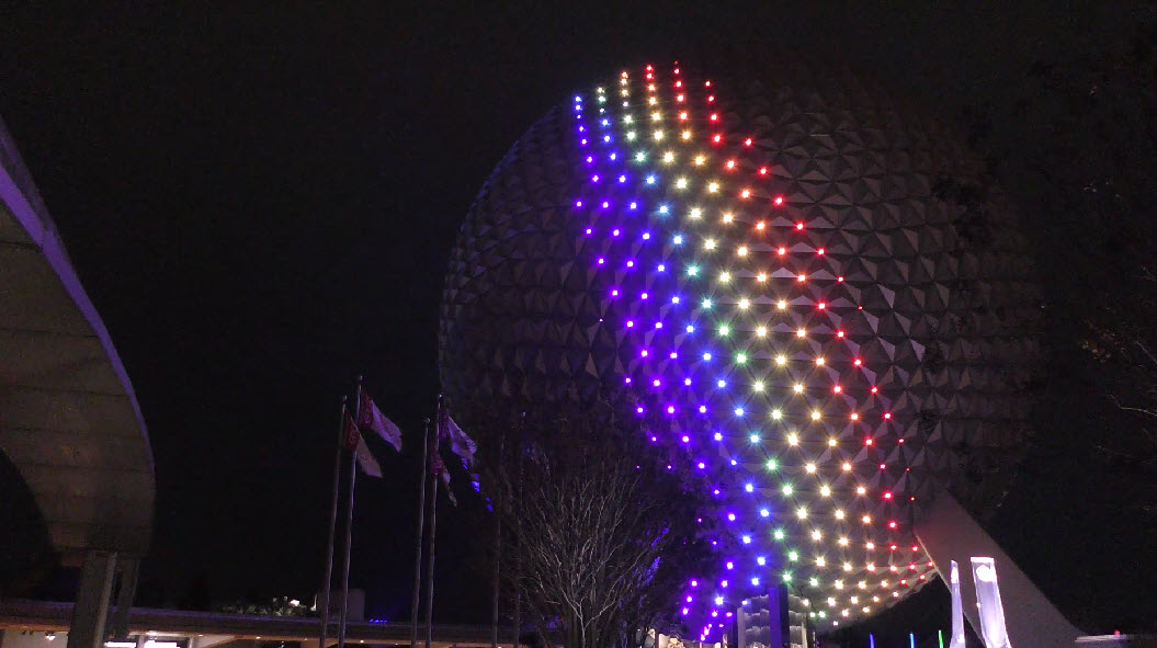 Epcot's iconic Spaceship Earth transforms with stunning lighting, now extending to World Celebration Garden, enchanting visitors at festivals