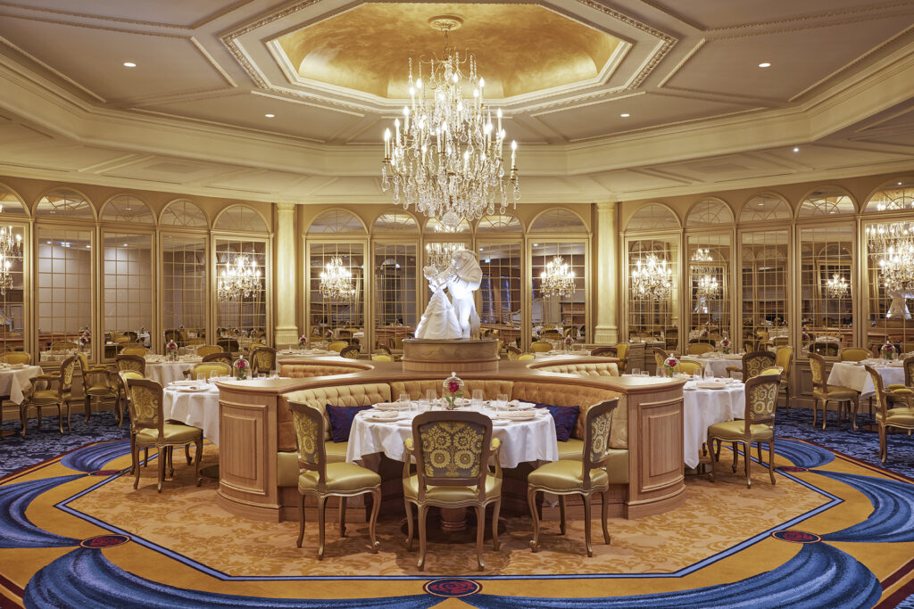 At La Table de Lumière, guests enjoy table service dinner in a space paying homage to the Beauty and the Beast ballroom scene, which itself was inspired by the Hall of Mirrors in Versailles Castle
