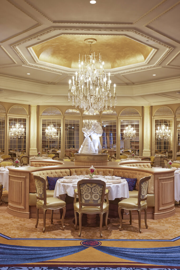 At La Table de Lumière, guests enjoy table service dinner in a space paying homage to the Beauty and the Beast ballroom scene, which itself was inspired by the Hall of Mirrors in Versailles Castle