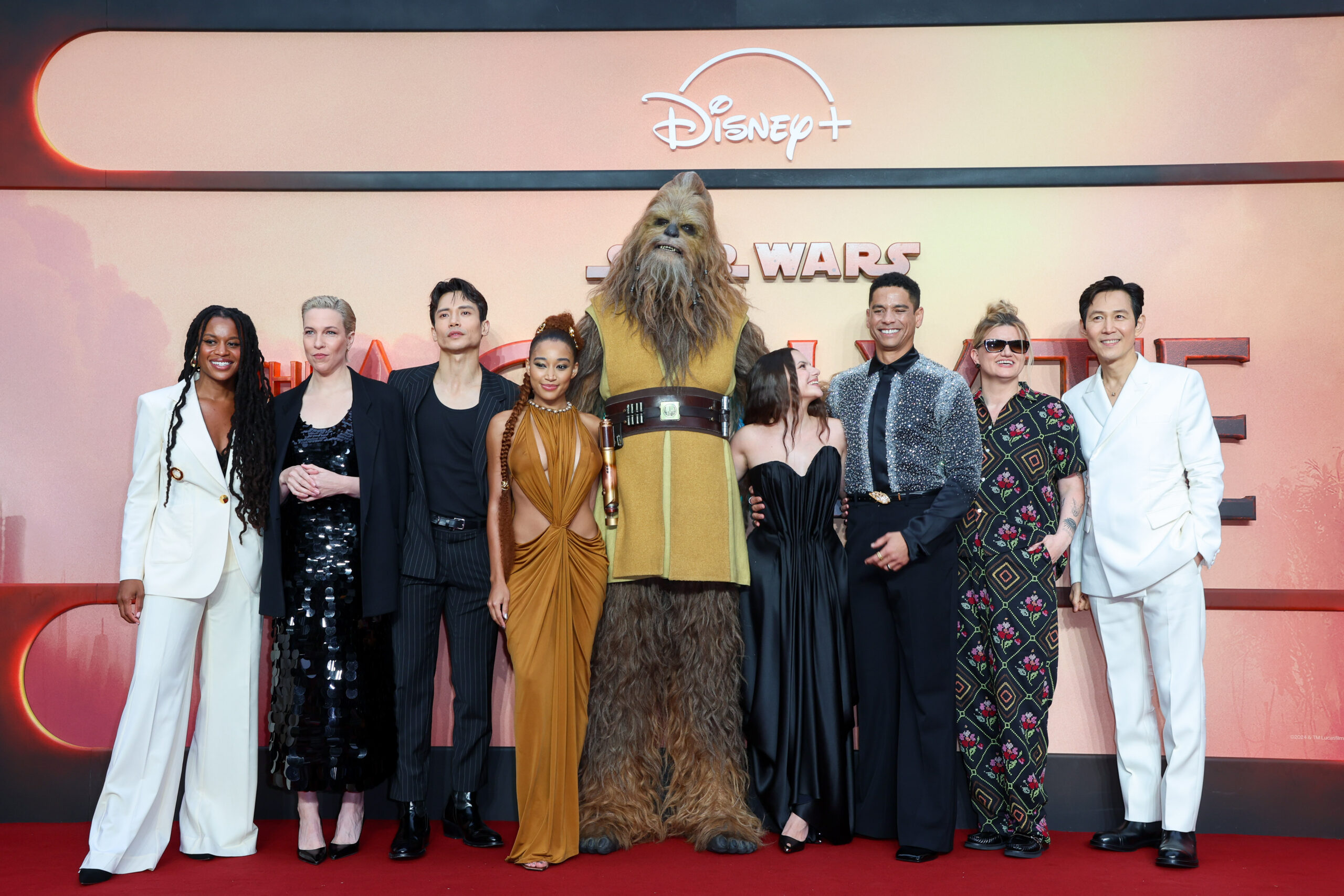 (L to R) Rayne Roberts, Rebecca Henderson, Manny Jacinto, Amandla Stenberg, Kelnacca, Dafne Keen Fernández, Charlie Barnett, Leslye Headland and Lee Jeong-jae attend the UK Premiere of Lucasfilm's 'The Acolyte' at Odeon Luxe Leicester Square in London, on May 28, 2024. (Photo by StillMoving.Net for Disney)