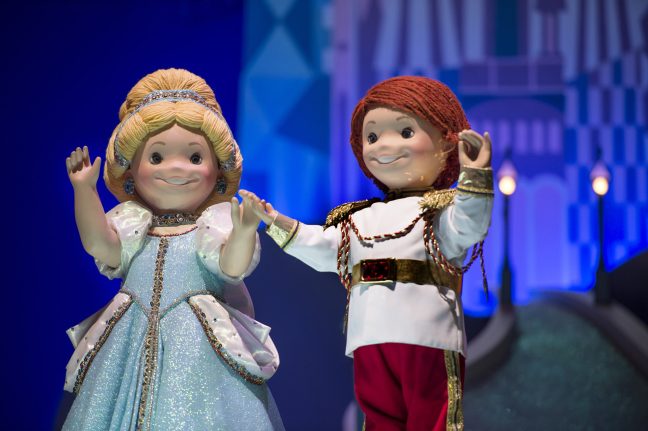 Cinderella and Prince Charming as dolls in "it's a small world"