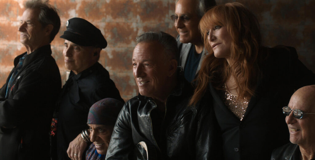 Garry Tallent, Nils Lofgren, Steven Van Zandt, Bruce Springsteen, Max Weinberg, Patti Scialfa, and Roy Bittan seen in Road Diary: Bruce Springsteen and The E Street Band