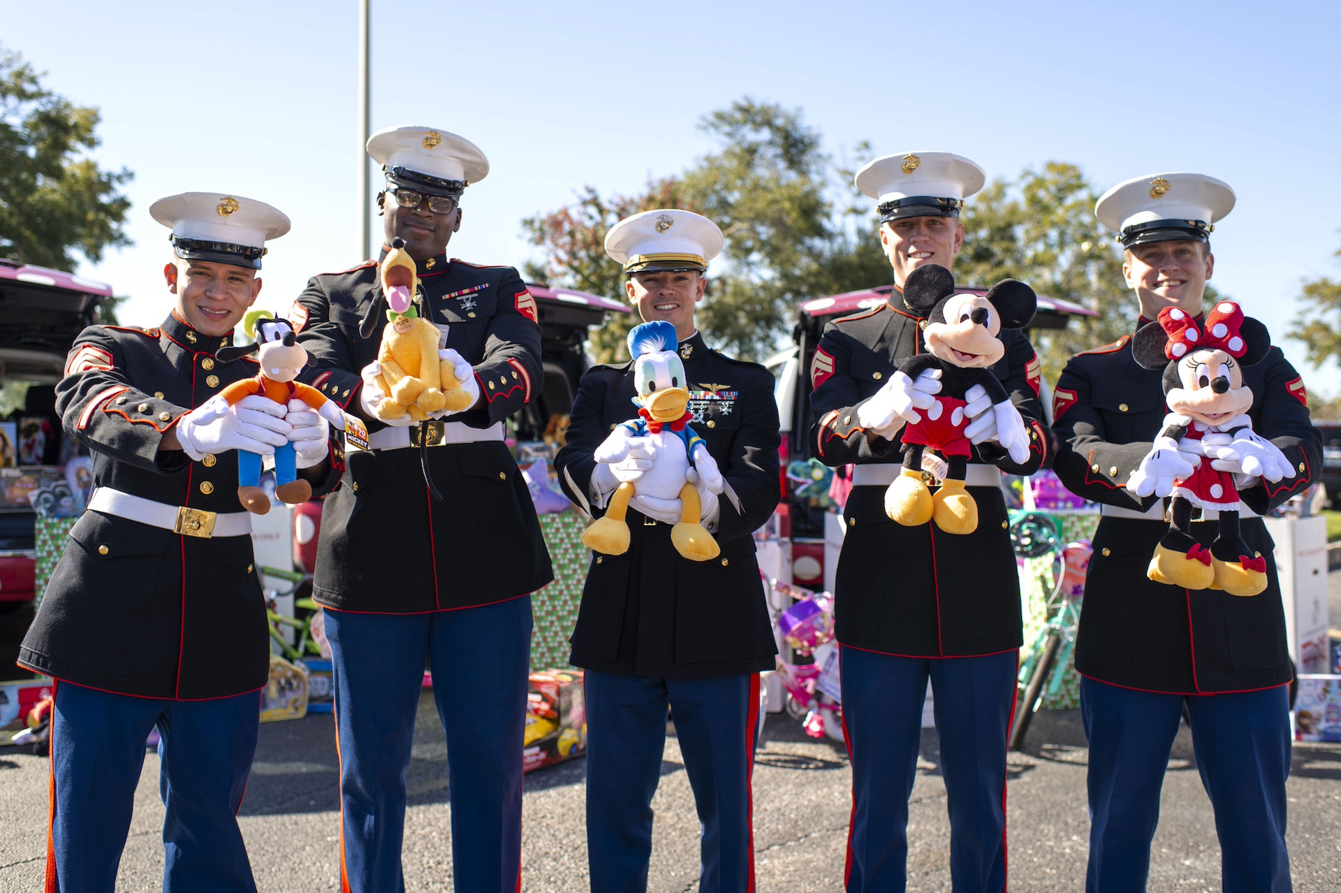 Marines with Disney Plush - Disney Ultimate Toy Drive, supporting the Marine Toys for Tots Program