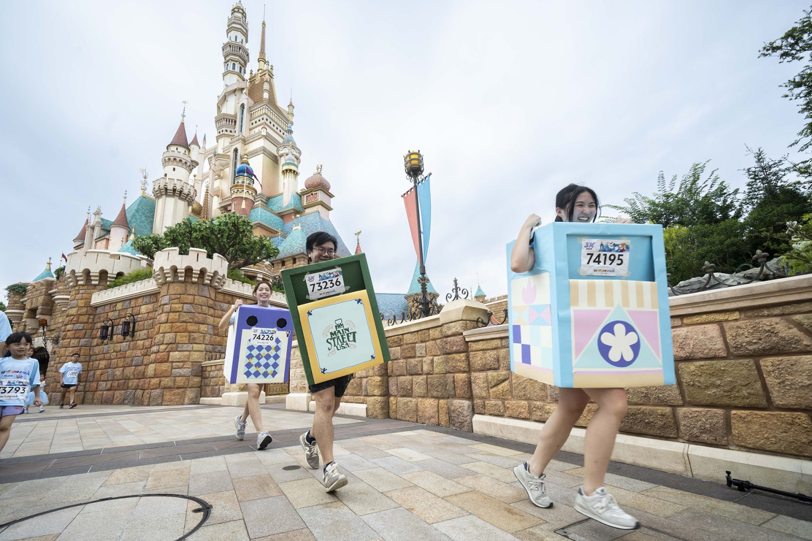 Fans dress up as the Hong Kong Disneyland trash cans