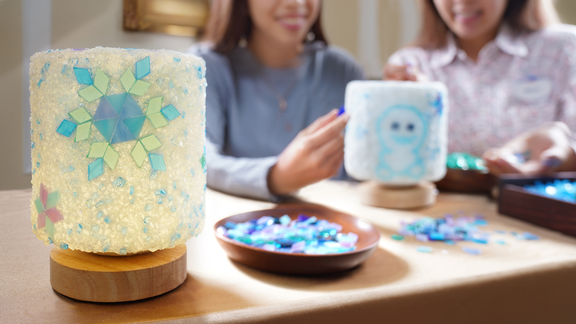 Guests crafting an Enchanted Frozen Mosaic Night Lamp