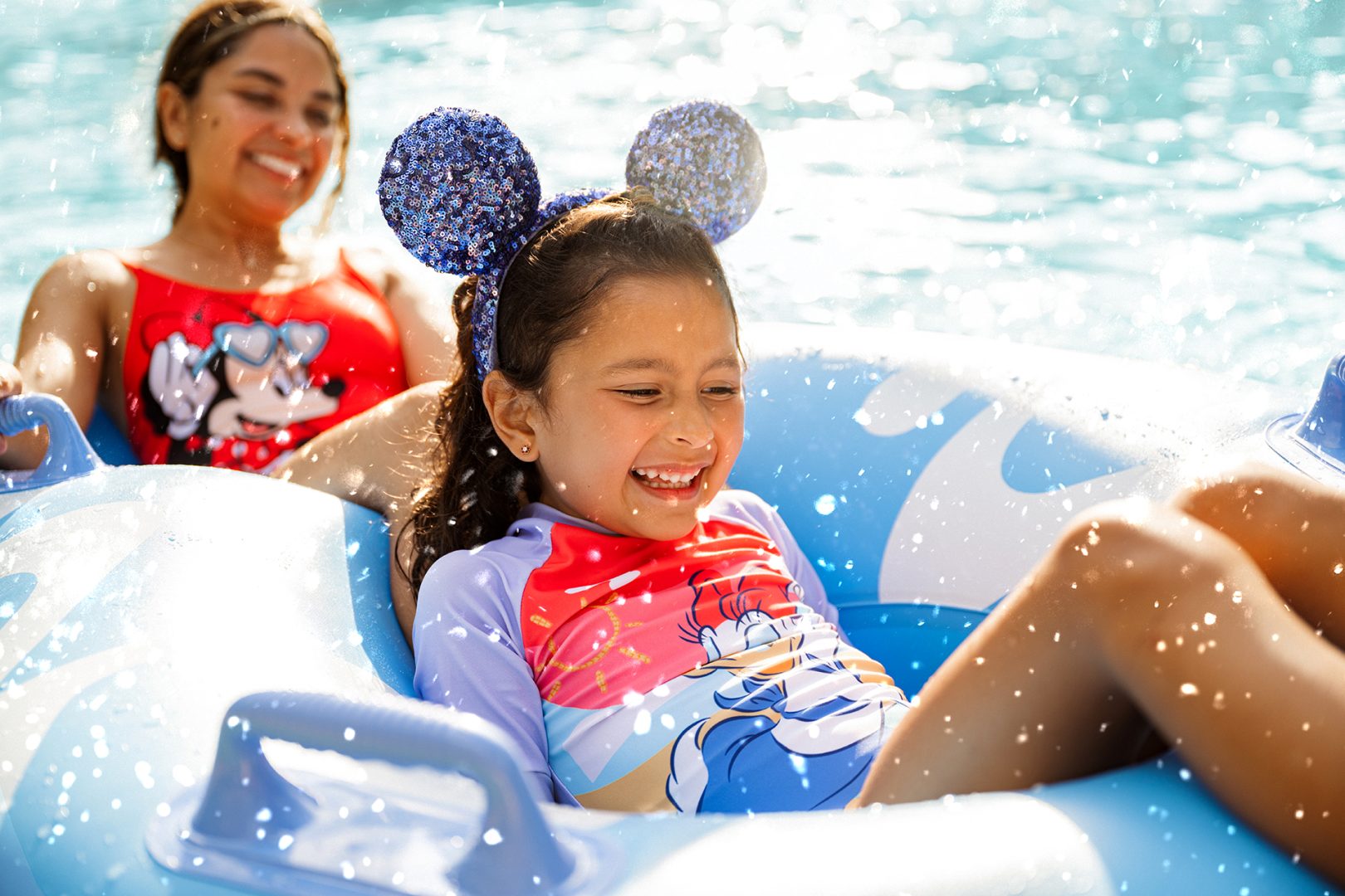 A family smiles at Disney Water Parks