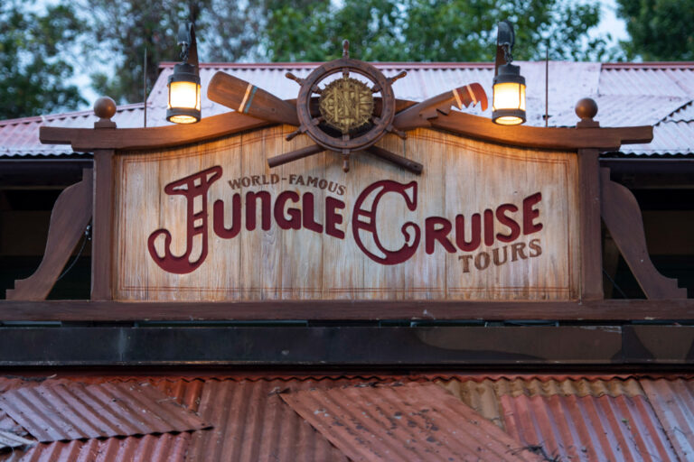 The iconic Jingle Cruise sign welcomes guests to a holiday adventure at Magic Kingdom.