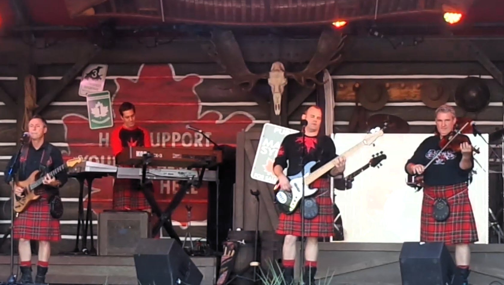 Off Kilter performing on the Mill Stage at EPCOT's Canada Pavilion in 2012, showcasing their signature blend of Celtic music and rock ‘n’ roll.