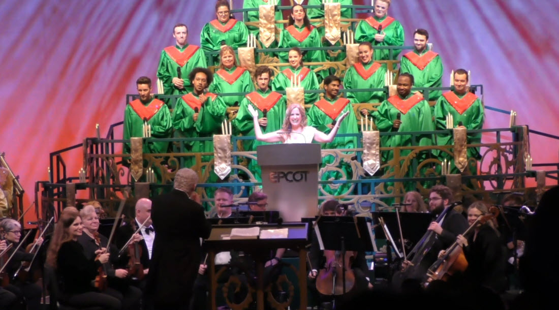 Jodi Benson lights up the stage as she narrates the story of Christmas during the final 2024 Candlelight Processional at EPCOT’s Festival of the Holidays