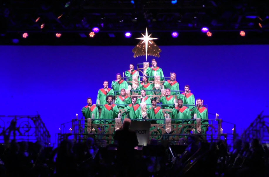 Jodi Benson lights up the stage as she narrates the story of Christmas during the final 2024 Candlelight Processional at EPCOT’s Festival of the Holidays