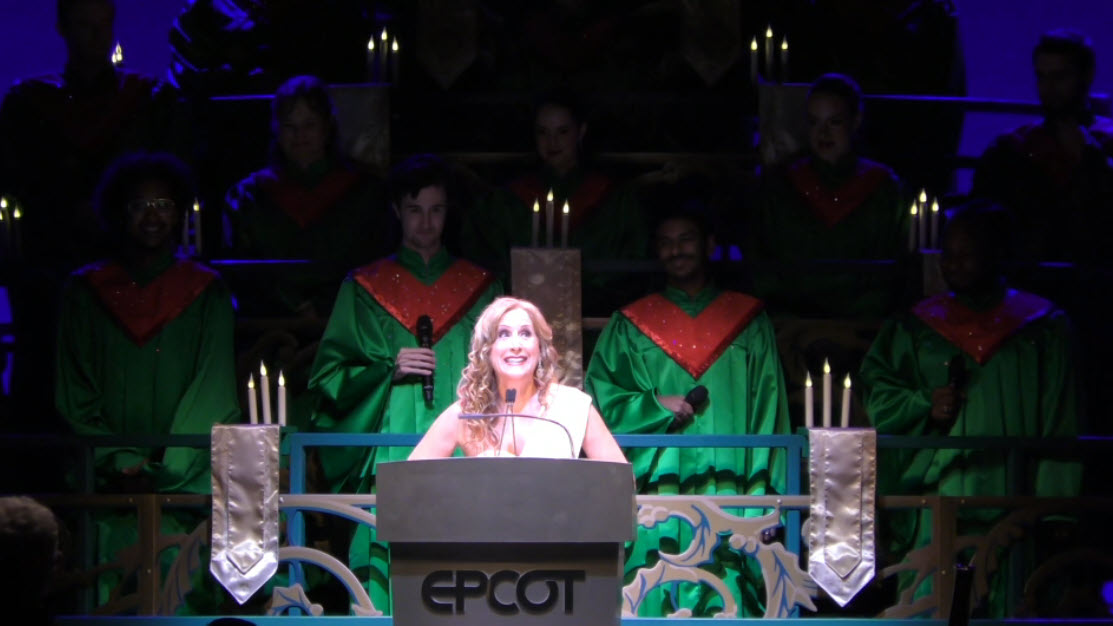 Jodi Benson lights up the stage as she narrates the story of Christmas during the final 2024 Candlelight Processional at EPCOT’s Festival of the Holidays