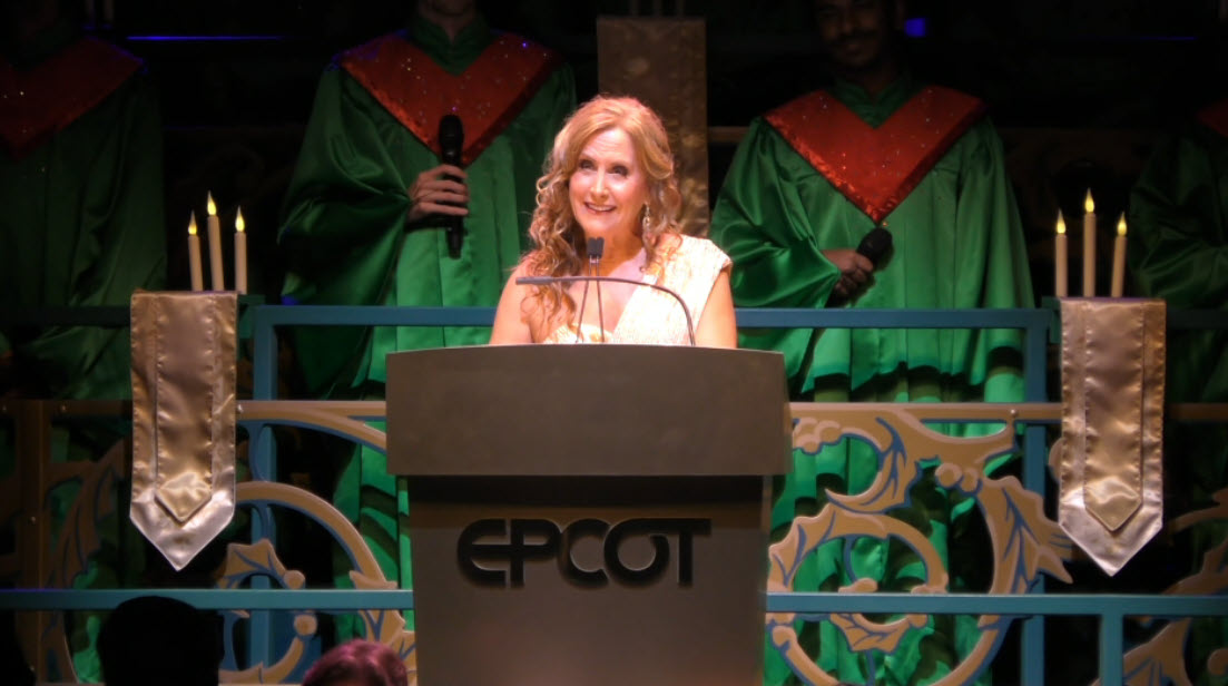 Jodi Benson lights up the stage as she narrates the story of Christmas during the final 2024 Candlelight Processional at EPCOT’s Festival of the Holidays