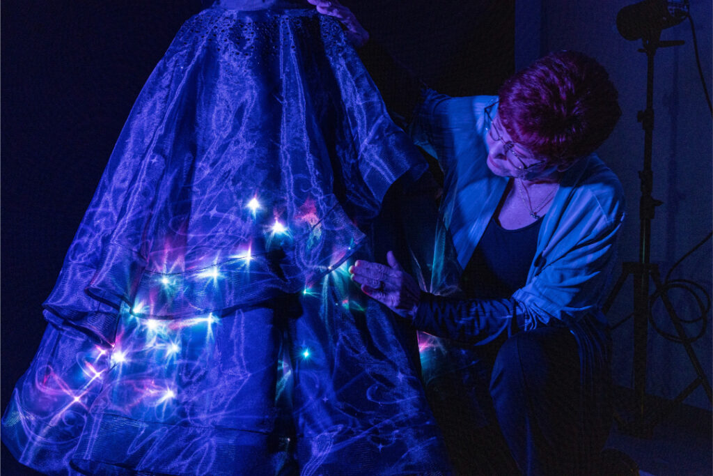 Disney Starlight Parade concept art showcases stunning illuminated floats, featuring iconic scenes from Moana, Encanto, Frozen, and Peter Pan, debuting this summer at Magic Kingdom