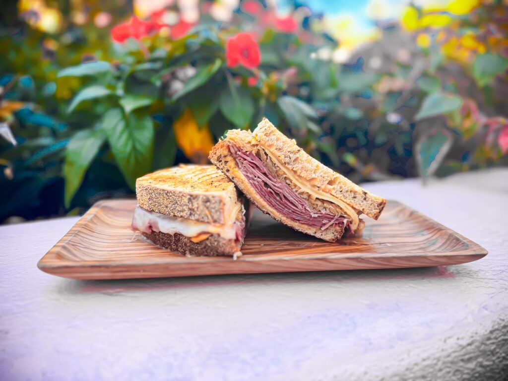 Corned Beef Handheld at The Market – Corned beef, Swiss cheese, and sauerkraut on rye.